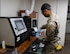 U.S. Air Force Airman 1st Class Omar Murphy, 5th Maintenance Squadron non-destructive inspection (NDI) apprentice, prepares to conduct an oil analysis at Minot Air Force Base, North Dakota, June 6, 2024. NDI technicians are responsible for identifying possible defects in systems and equipment before anything can become a dangerous problem. (U.S. Air Force photo by Airman 1st Class Luis Gomez)