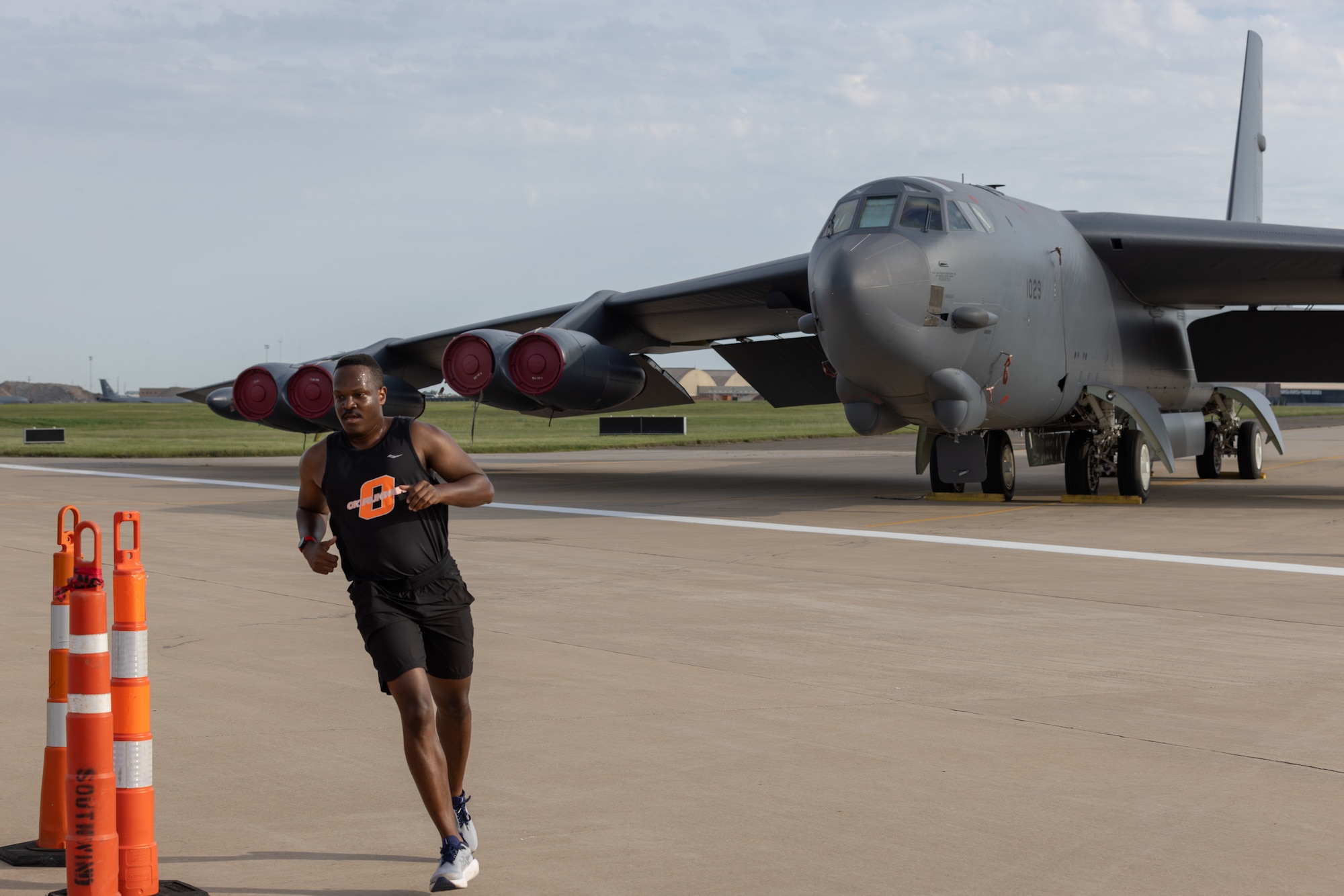 man running by b52