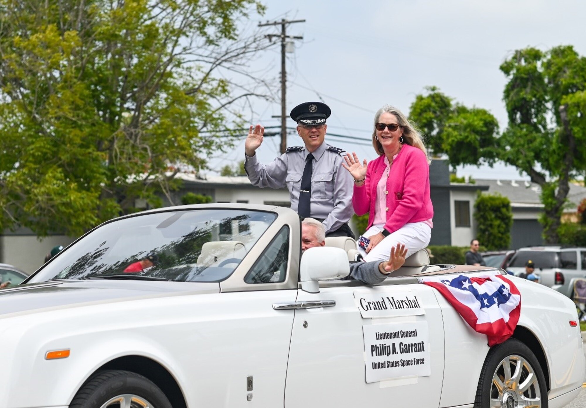 U.S. Space Force Lt. Gen. Philip Garrant, serving as grand marshal of the Torrance Armed Forces Day parade, leads Space Systems Command, headquartered on Los Angeles Air Force Base in El Segundo, Calif., just a few miles from the parade route. Garrant is pictured with his wife, Ms. Heather Garrant, right, during the parade.