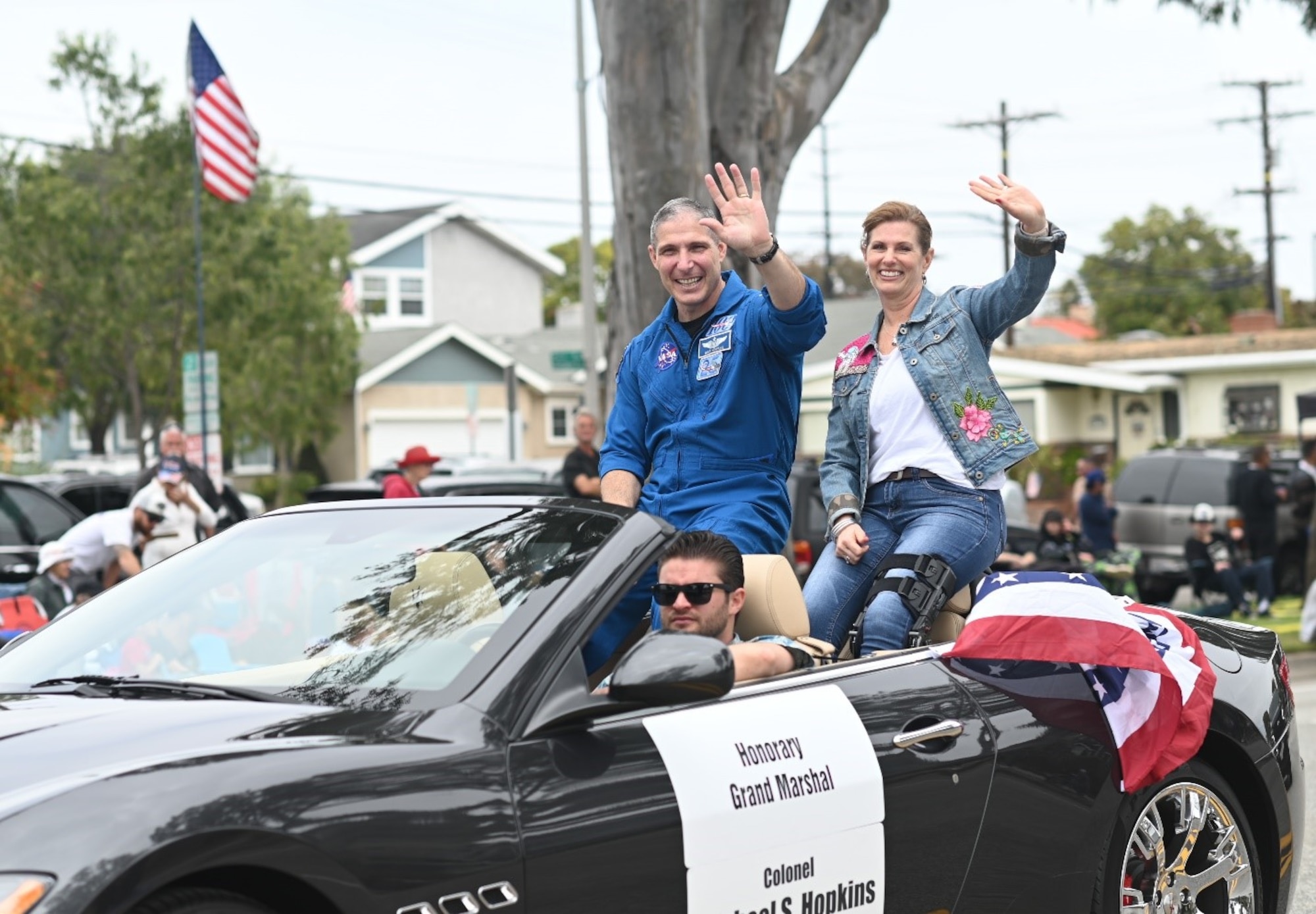 The first-ever Guardian astronaut, retired Space Force Col. Michael Hopkins, served as the honorary grand marshal at the Torrance Armed Forces Day Parade on May 18. Hopkins is a former NASA astronaut who served aboard the International Space Station in 2020, logging a total of 168 days in space and transferring from the U.S. Air Force to the Space Force while in orbit. Hopkins is pictured with his wife, Ms. Julie Hopkins, right, during the parade.