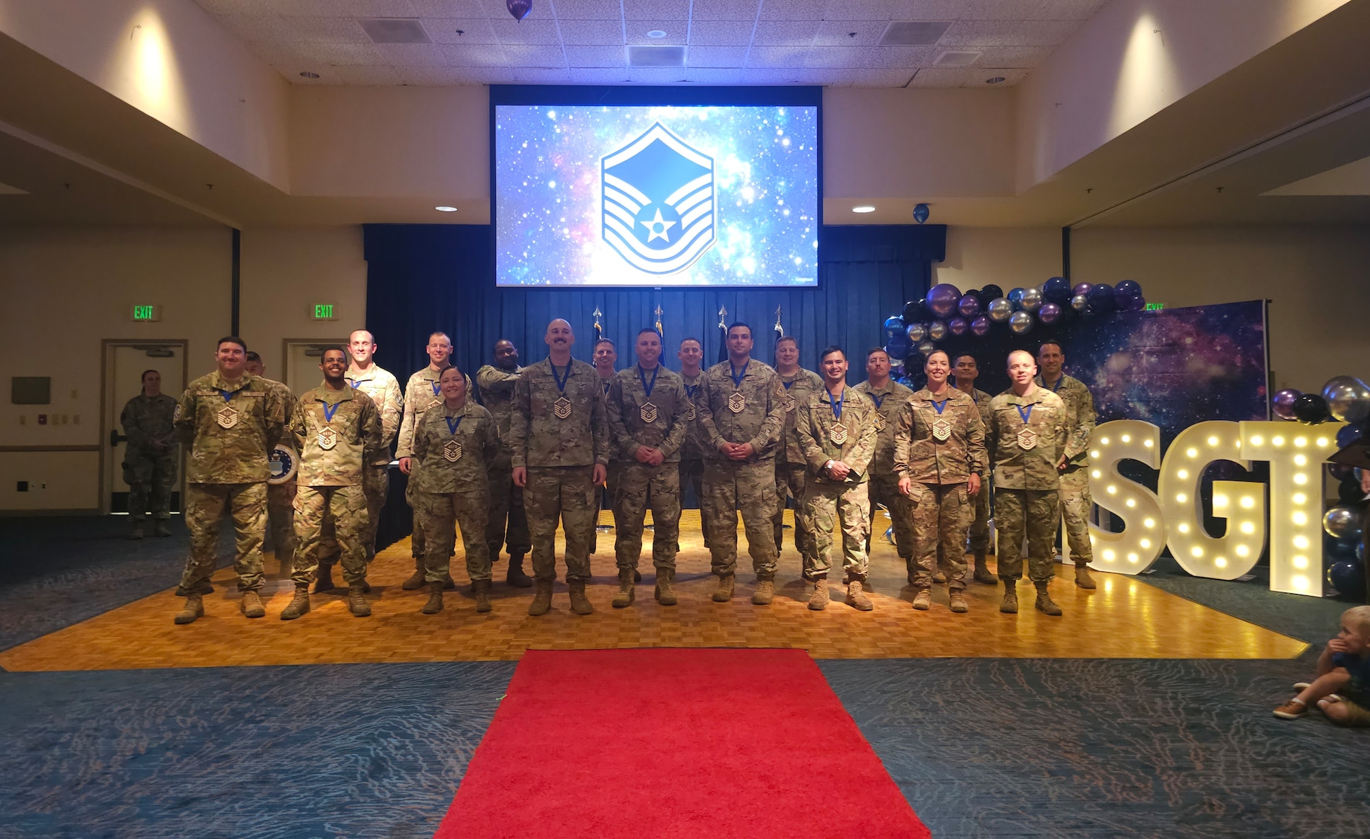 The newest Master Sergeant selectees pose for a photo during a MSgt. release part at Vandenberg Space Force Base.