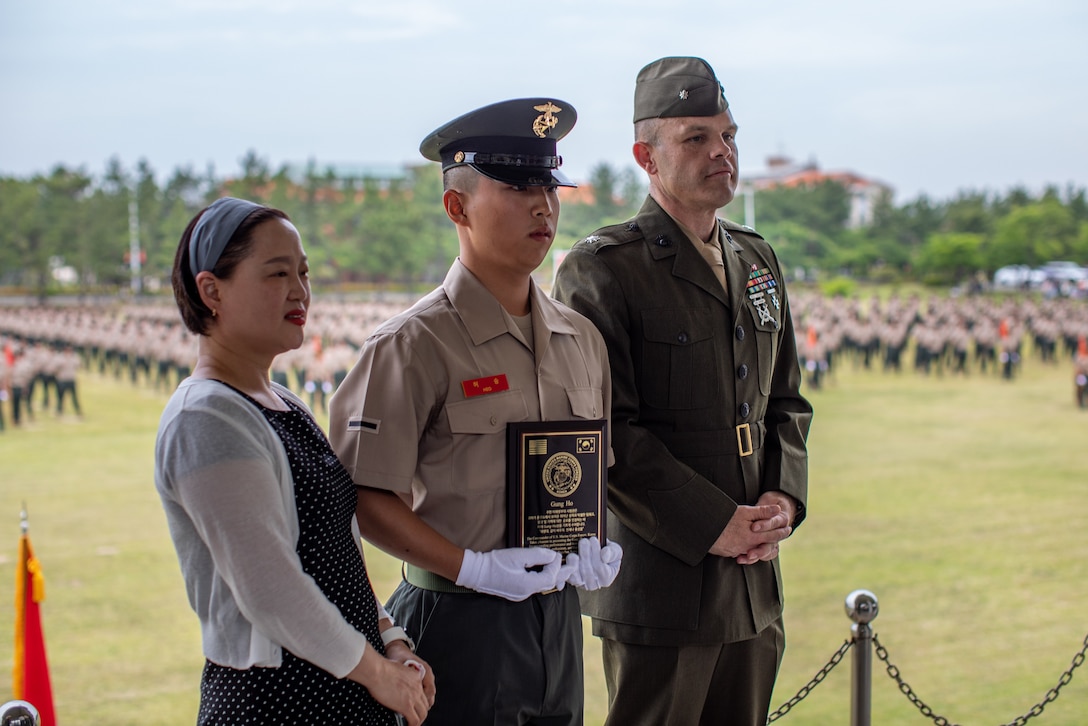 U.S. Marine Corps Lt. Col. Willis Staton, right, an assistant chief of staff for U.S. Marine Corps Forces Korea, poses for a picture with a Republic of Korea Marine during a Republic of Korea Marine Corps bootcamp graduation in Pohang, South Korea, May 30, 2024. MARFORK is the U.S. Marine Corps service component for United States Forces Korea and United Nations Command. MARFORK commands all U.S. Marine Forces assigned to USFK and UNC; as well as advises on the Marine Corps capabilities, support and proper employment of Marine Forces. (U.S. Marine Corps photo by Cpl. Dean Gurule)