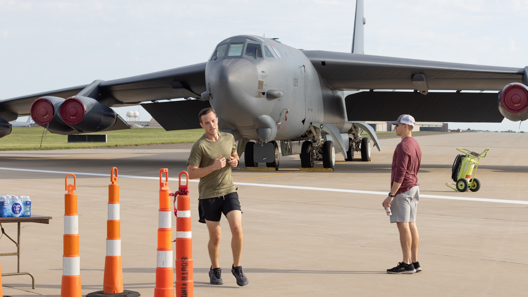 man running by b52