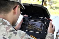 U.S. Soldiers with the Army National Guard train with RQ-28A short range reconnaissance quadcopters during a field training exercise at Fort Indiantown Gap, Pennsylvania, June 6, 2024. Instructors with the Pennsylvania National Guard's 166th Regiment Regional Training Institute led the training, where Soldiers gained the most up-to-date knowledge and readiness with these drones. (U.S. Army National Guard photo by Spc. Aliyah Vivier)