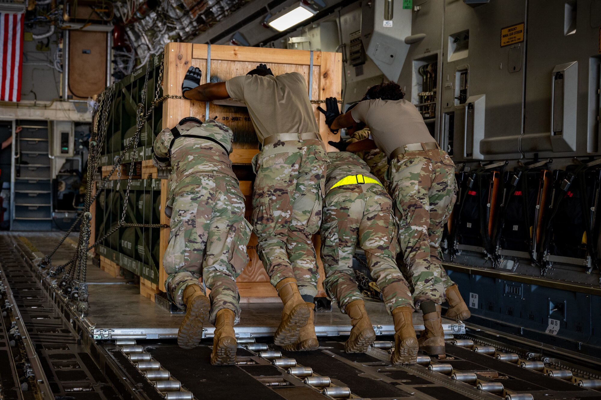 Airmen assigned to the 305th Aerial Port Squadron upload munitions onboard a C-17 Globemaster III at Joint Base McGuire-Dix-Lakehurst, N.J.. The munitions cargo is part of an additional security assistance package for Ukraine. The security assistance the U.S. is providing to Ukraine is enabling critical success on the battlefield against the Russian invading force. (U.S. Air Force photo by 2nd Lt. Alexis Kula)