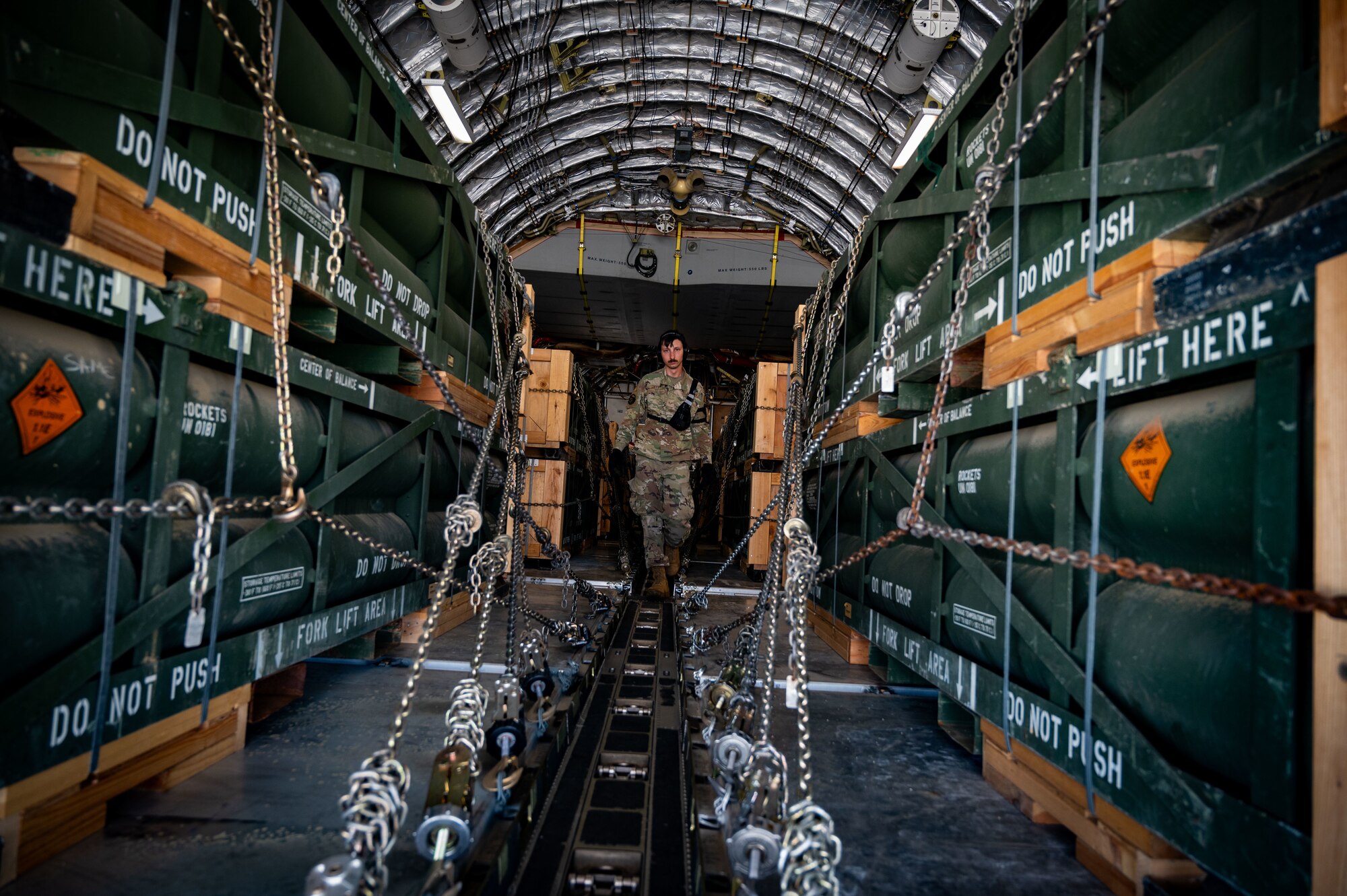 An Airman assigned to the 305th Aerial Port Squadron upload munitions onboard a C-17 Globemaster III at Joint Base McGuire-Dix-Lakehurst, N.J. The munitions cargo is part of an additional security assistance package for Ukraine. The security assistance the U.S. is providing to Ukraine is enabling critical success on the battlefield against the Russian invading force. (U.S. Air Force photo by 2nd Lt. Alexis Kula)