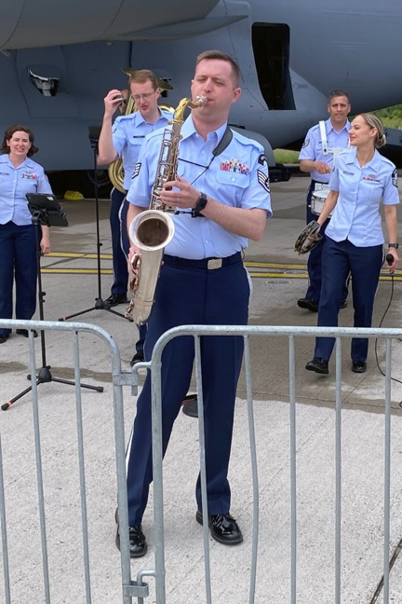 Staff Sgt. Joe Rulli performs with the Wings of Swing, part of the U.S. Air Forces in Europe-Air Force Africa band, performs during industry days at the Berlin Innovation & Leadership in Aerospace trade show and air show, June 5, 2024, in Berlin, Germany. The band’s mission is to be build international relationships through a shared love of music. The band played at the industry days, ceremonial events at government centers in Berlin and at the show’s public days. (U.S. Air Force photo by Senior Master Sgt. Dan Heaton)