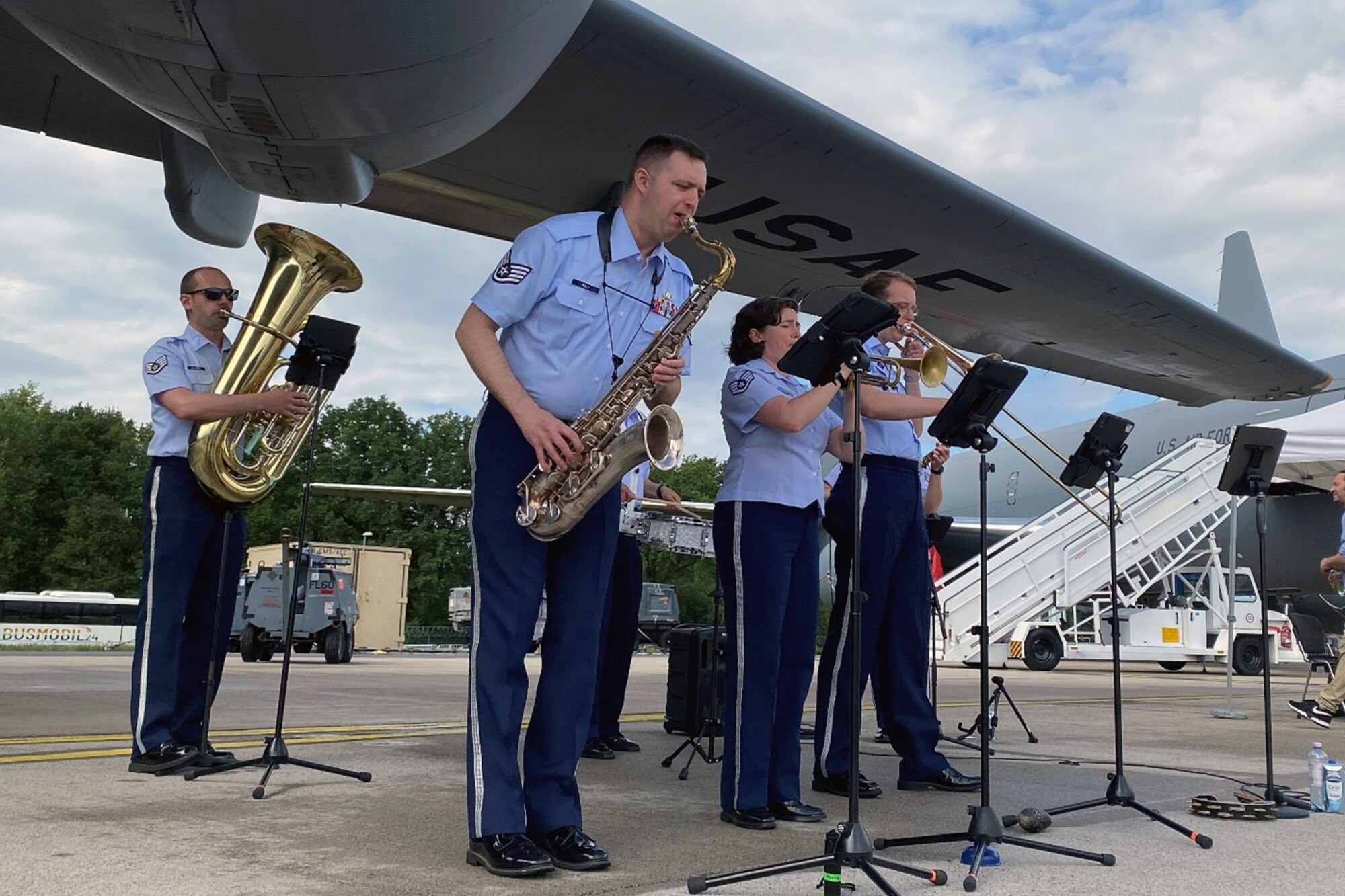 Staff Sgt. Joe Rulli performs with the Wings of Swing, part of the U.S. Air Forces in Europe-Air Force Africa band, performs during industry days at the Berlin Innovation & Leadership in Aerospace trade show and air show, June 5, 2024, in Berlin, Germany. The band’s mission is to be build international relationships through a shared love of music. The band played at the industry days, ceremonial events at government centers in Berlin and at the show’s public days. (U.S. Air Force photo by Senior Master Sgt. Dan Heaton)