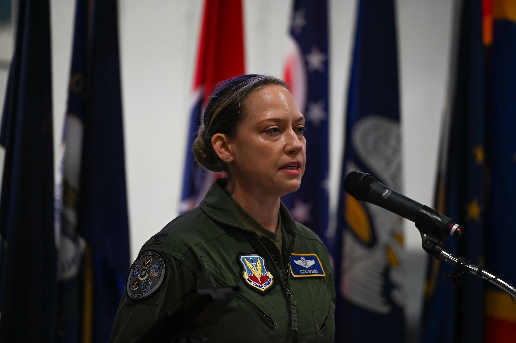 U.S. Air Force Col. Candice Sperry, 350th Spectrum Warfare Group commander, gives her first remarks to the wing as the group commander during the change of command ceremony at the U.S. Armament Museum, Eglin Air Force Base, Florida, June 7, 2024. The 350th SWG continuously tests and improves the U.S. Air Force's rapid reprogramming capabilities to ensure the Combat Air Force is ready for near-peer threats. (U.S. Air Force photo by Capt. Benjamin Aronson)