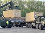 Soldiers the 30th Medical Brigade and 16th Sustainment Brigade transport 26 twenty-foot containers of medical materiel from Army Prepositioned Stocks in Dülmen to Baumholder Training Center, Germany as part of DEFENDER 24. (Ellen Crown)