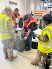 As part of the DEFENDER 24 exercise, Soldiers conduct a joint inventory of medical equipment and supplies before handing of a field hospital released from Army Prepositioned Stocks at APS-2 in Dülmen, Germany. This year was the Army’s first time ever releasing a 32-bed field hospital from APS-2 medical stocks maintained by the U.S. Army Medical Materiel Agency, or USAMMA, a direct reporting unit of the U.S. Medical Logistics Command. (Ellen Crown)