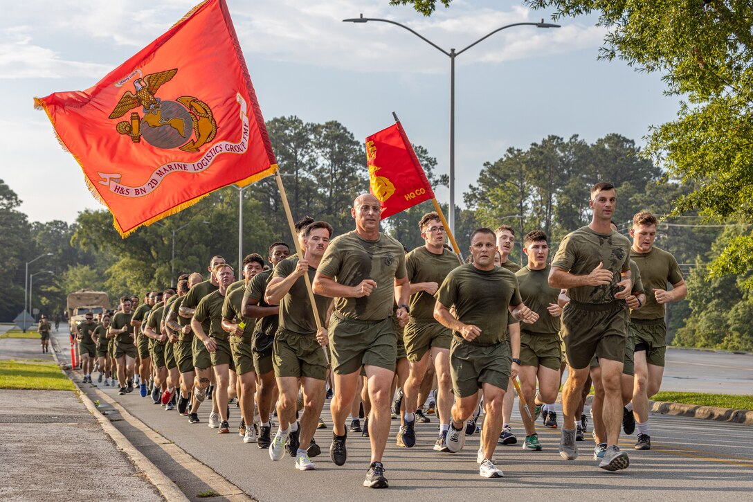 U.S. Marines with Headquarters and Service Battalion, 2nd Marine Logistics Group, participate in a Battalion run on Camp Lejeune, North Carolina, June 7, 2024.  Marines with H&S Battalion held a Battalion run to build camaraderie and increase physical readiness. (U.S. Marine Corps photo by Lance Cpl. Christian Salazar)