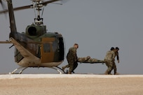 U.S. Army Soldiers from the 909th Forward Resuscitative and Surgical Detachment conduct a medical evacuation rehearsal with the Tunisian Armed Forces in Ben Ghilouf, Tunisia, on May 3, 2024. African Lion 2024 marks the 20th anniversary of U.S. Africa Command’s premier joint exercise led by U.S. Army Southern European Task Force, Africa (SETAF-AF), running from April 19 to May 31 across Ghana, Morocco, Senegal, and Tunisia, with over 8,100 participants from 27 nations and NATO contingents. (Pfc. Trevor Seiler)