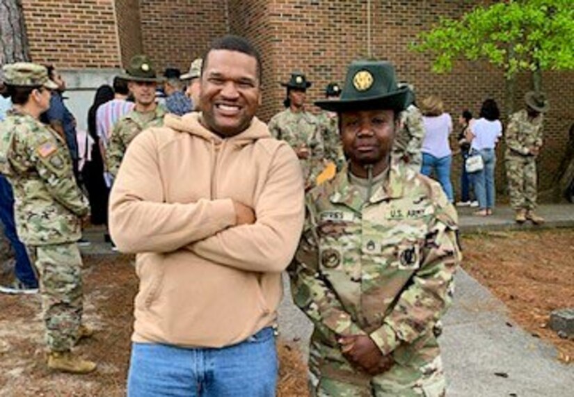 Staff Sgt. Vontrella Jeffries, right, graduates from the U.S. Army Drill Sergeant Academy, April 10, at Fort Jackson, South Carolina. The Drill Sergeant Academy is a nine-week course that turns noncommissioned officers into drill sergeants. (Courtesy)
