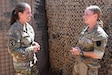 U.S. Army Staff Sgt. Lisa Marie Duffy, Retention NCO, Task Force Paxton, engages with soldiers from Task Force Paxton across the Horn of Africa. Her mission consists of assisting soldiers wanting to reenlist in the National Guard while deployed and educating all soldiers on the many benefits available to them as service members. (U.S. Air National Guard photo by Staff Sgt. Juan M. Paz)