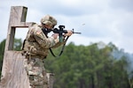 A Georgia Army National Guard Soldier assigned to Headquarters Company, 48th Infantry Brigade Combat Team, fires an M4 carbine rifle for annual qualification on a training range in Fort Stewart, Ga., June 5, 2024.
