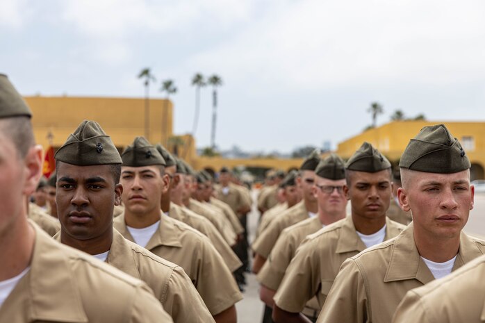 New U.S. Marines with Fox Company, 2nd Recruit Training Battalion, stand in formation before their Family Day ceremony at Marine Corps Recruit Depot San Diego, California, May 30, 2024. After a long, 13 weeks of physical and mental challenges, early mornings, letters to and from home, this is the first time friends and families will see their newly transformed Marines. (U.S. Marine Corps photo by Cpl. Sarah M. Grawcock)
