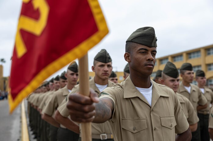 New U.S. Marines with Fox Company, 2nd Recruit Training Battalion, stand in formation before their Family Day ceremony at Marine Corps Recruit Depot San Diego, California, May 30, 2024. After a long, 13 weeks of physical and mental challenges, early mornings, letters to and from home, this is the first time friends and families will see their newly transformed Marines. (U.S. Marine Corps photo by Cpl. Sarah M. Grawcock)