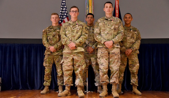 The U.S. Army Space and Missile Defense Command names its 2024 Best Squad, June 6. Front row, from left: Soldier of the Year, Spc. Chase A. Betsinger, intelligence analyst, 18th Space Control Company, 1st Space Battalion, 1st Space Brigade; and NCO of the Year, Sgt. 1st Class Monte Perkins, satellite communications systems operator-maintainer, 4th Space Control Company, 1st Space Battalion, 1st Space Brigade; back row, from left: Sgt. Axyle Z. Belveal, information technology specialist, 100th Missile Defense Brigade; Sgt. Jonathan Flores, unit supply specialist, Headquarters and Headquarters Company, 1st Space Battalion, 1st Space Brigade; and Sgt. Jankiel J. Bernadeau-Rojas, human resources specialist, 100th Missile Defense Brigade.. All of the squad members are stationed in the Colorado Springs, Colorado, area. (U.S. Army photo by Carrie David Campbell)