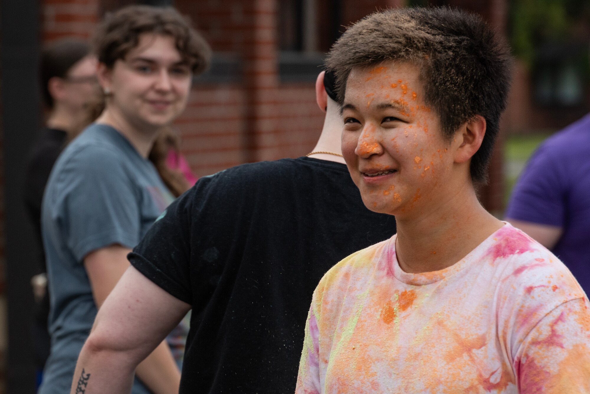 A1C Yuxin Chan, 4th CES, finishes a National Pride Month Color Run event.