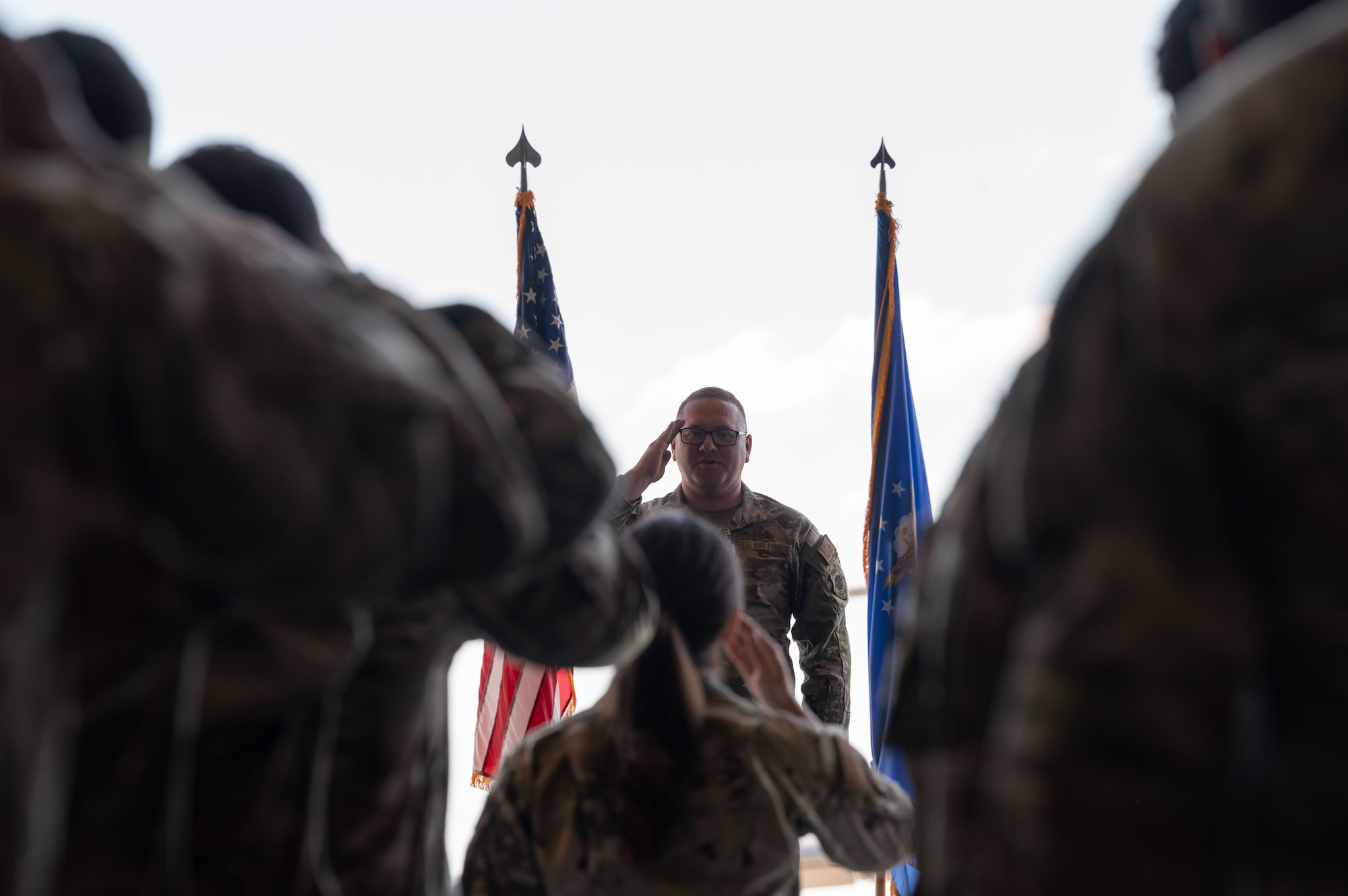 U.S. Air Force Lt. Col. Alexander Barnett, outgoing 436th Aircraft Maintenance Squadron commander, accepts a final salute from his unit during a change of command ceremony at Dover Air Force Base, Delaware, June 10, 2024. The ceremony saw Barnett relinquish command to Maj. Joshua Belanger. (U.S. Air Force photo by Dieondiere Jefferies)