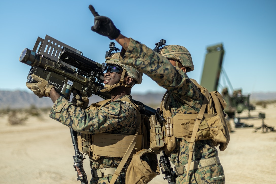 U.S. Marine Corps Lance Cpl. Terrell Chandler, left, and U.S. Marine Corps Lance Cpl. Melvin Monet, both low-altitude-air defense gunners with 3d Littoral Anti-Air Battalion, 3d Marine Littoral Regiment, 3d Marine Division, set security with an FIM-92 Stinger during Marine Littoral Regiment Training Exercise (MLR-TE) at Marine Corps Air Station Yuma, Arizona, Jan. 28, 2023. MLR-TE is a large-scale, service-level exercise designed to train, develop, and experiment with the 3d MLR as part of a Marine Air-Ground Task Force operating as a Stand-in Force across a contested and distributed maritime environment. (U.S. Marine Corps photo by Sgt. Israel Chincio)