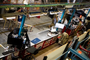 Overview of tool kit warehouse including Airmen