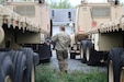 Soldiers with the 131st Transportation Company, 228th Transportation Battalion, 213th Regional Support Group drive M915 tractor trucks in a cross-country convoy during Army Materiel Command's Operation Patriot Press, May 4, 2024. The annual nationwide ammunition redistribution mission supports the Army’s strategic positioning goals. (U.S. Army National Guard photo by Sgt. Du-Marc Mills)