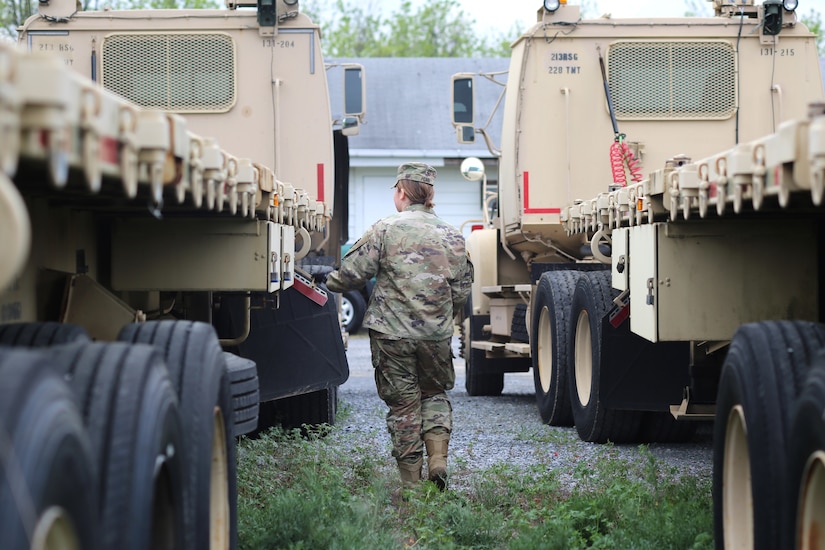 Soldiers with the 131st Transportation Company, 228th Transportation Battalion, 213th Regional Support Group drive M915 tractor trucks in a cross-country convoy during Army Materiel Command's Operation Patriot Press, May 4, 2024. The annual nationwide ammunition redistribution mission supports the Army’s strategic positioning goals. (U.S. Army National Guard photo by Sgt. Du-Marc Mills)