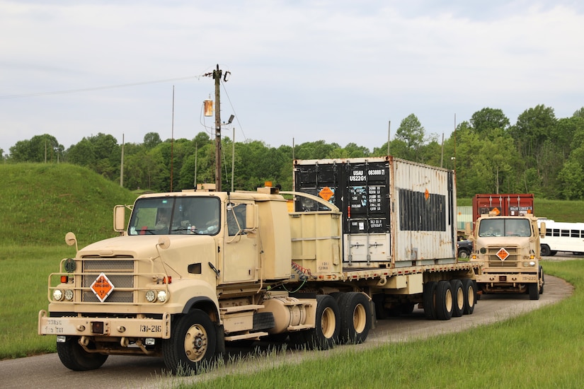 Soldiers with the 131st Transportation Company, 228th Transportation Battalion, 213th Regional Support Group drive M915 tractor trucks in a cross-country convoy during Army Materiel Command's Operation Patriot Press, May 4, 2024. The annual nationwide ammunition redistribution mission supports the Army’s strategic positioning goals. (U.S. Army National Guard photo by Sgt. Du-Marc Mills)