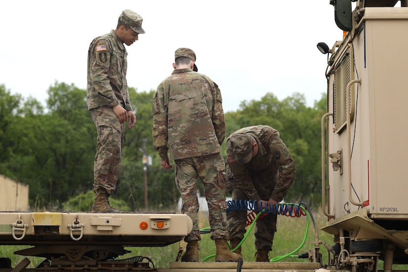 Soldiers with the 131st Transportation Company, 228th Transportation Battalion, 213th Regional Support Group drive M915 tractor trucks in a cross-country convoy during Army Materiel Command's Operation Patriot Press, May 4, 2024. The annual nationwide ammunition redistribution mission supports the Army’s strategic positioning goals. (U.S. Army National Guard photo by Sgt. Du-Marc Mills)
