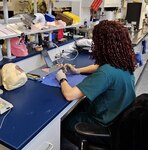 A student works in the maxillofacial laboratory. The Maxillofacial Dental Laboratory Technician course recently transitioned from the Navy Bureau of Medicine and Surgery to the Medical Education and Training Campus.