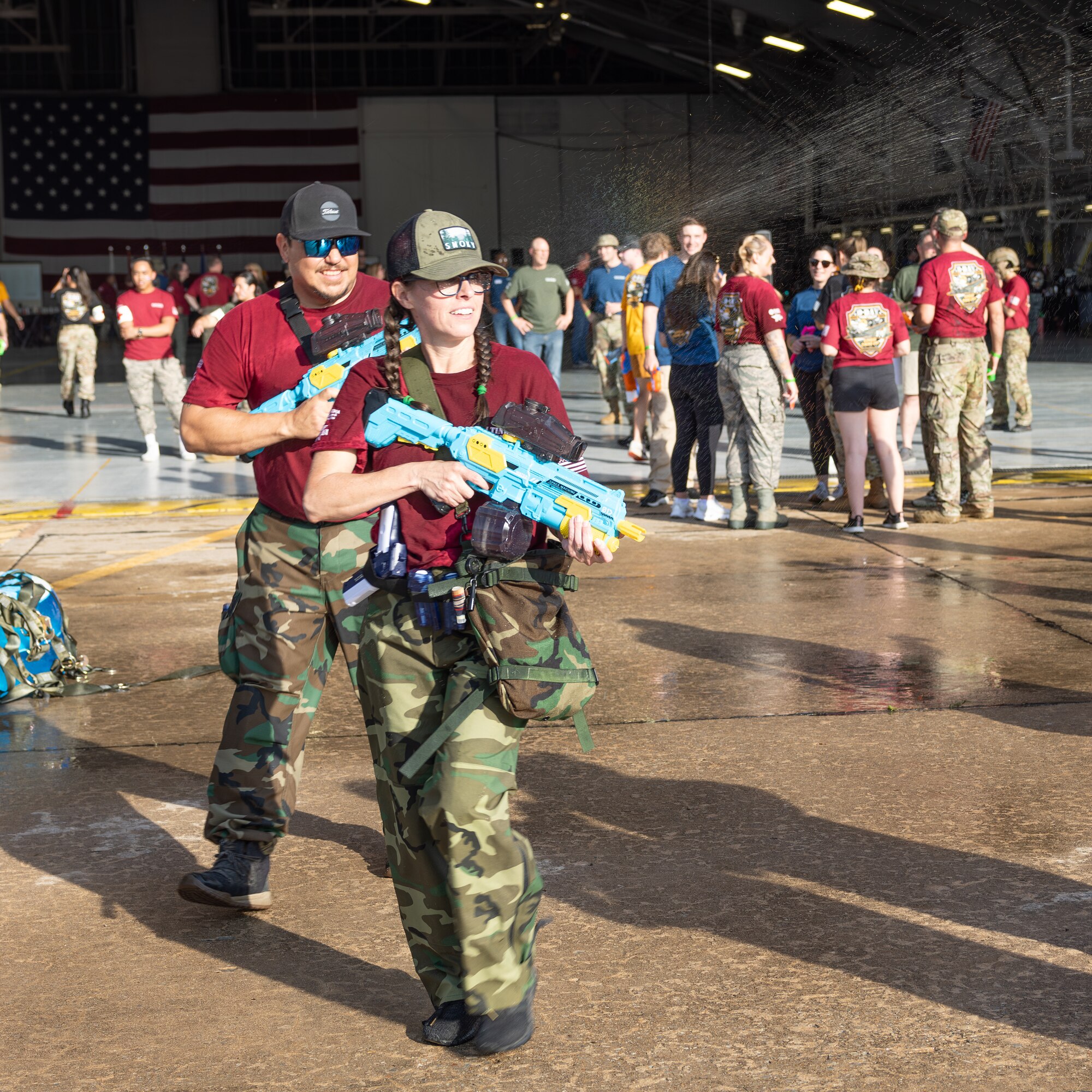 Man and woman with water guns