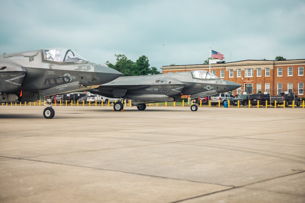 Two Lockheed Martin F-35 Lightning IIs sit on the flight line at Marine Corps Air Facility Quantico on Marine Corps Base Quantico, Virginia, June 5, 2024. The Primary mission of MCAF Quantico is to operate and maintain the facilities, and provide services and materiel to support the operations of Marine Helicopter Squadron 1, and other transient aircraft as required. (U.S. Marine Corps photo by Lance Cpl. Joaquin Dela Torre)