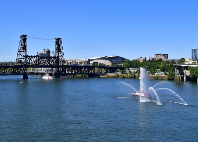 The U.S. Coast Guard Cutter John McCormick (WPC 1121) passes under Steel Bridge for the annual Rose Festival during Portland Fleet Week in Portland, Oregon June 5, 2024. Portland Fleet Week is a time-honored celebration of the sea services and provides an opportunity for the citizens of Oregon to meet Sailors, Marines and Coast Guardsmen, as well as witness firsthand the latest capabilities of today’s maritime services. (U.S. Navy photo by Mass Communication Specialist 1st Class Heather C. Wamsley)