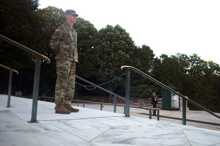 U.S. Army Maj. Gen. William Zana, director of international affairs with the National Guard Bureau, watches the changing of the guard at the Tomb of the Unknown Soldier at Arlington National Cemetery May 31, 2024. Zana, who served as a Tomb guard early in his career, stood watch at the Tomb as his final act in uniform.