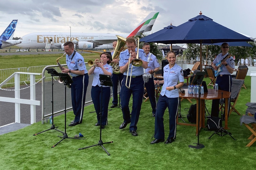 The Wings of Swing, part of the U.S. Air Forces in Europe-Air Force Africa band, performs during industry days at the Berlin Innovation & Leadership in Aerospace trade show and air show, June 5, 2024, in Berlin, Germany. The band’s mission is to be build international relationships through a shared love of music. The band played at the industry days, ceremonial events at government centers in Berlin and at the show’s public days. (U.S. Air Force photo by Senior Master Sgt. Dan Heaton)