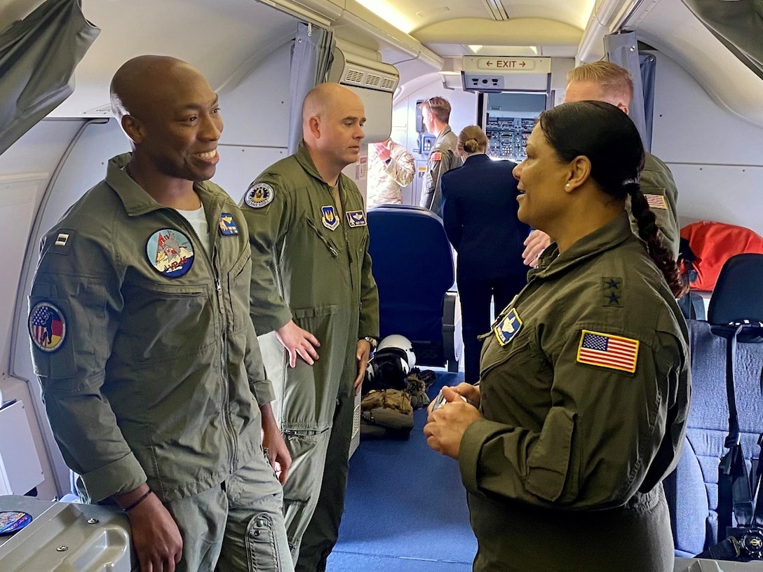 U.S. Air Force Maj. Gen. Dana Nelson, mobilization assistant to the deputy commander of United States Air Forces in Europe – Air Force Africa, talks with U.S. Navy Lt. Eman Smith, a pilot of a P-8 Poseidon from VP-45 Patrol and Reconnaissance Squadron, which is based at Naval Air Station Jacksonville, Florida, at the Berlin Innovation & Leadership in Aerospace trade show and air show, June 5, 2024, in Berlin, Germany. The U.S. Air Force, Army and Navy had aircraft on display at the show to support the longstanding partnership with Germany. (U.S. Air Force photo by Senior Master Sgt. Dan Heaton)