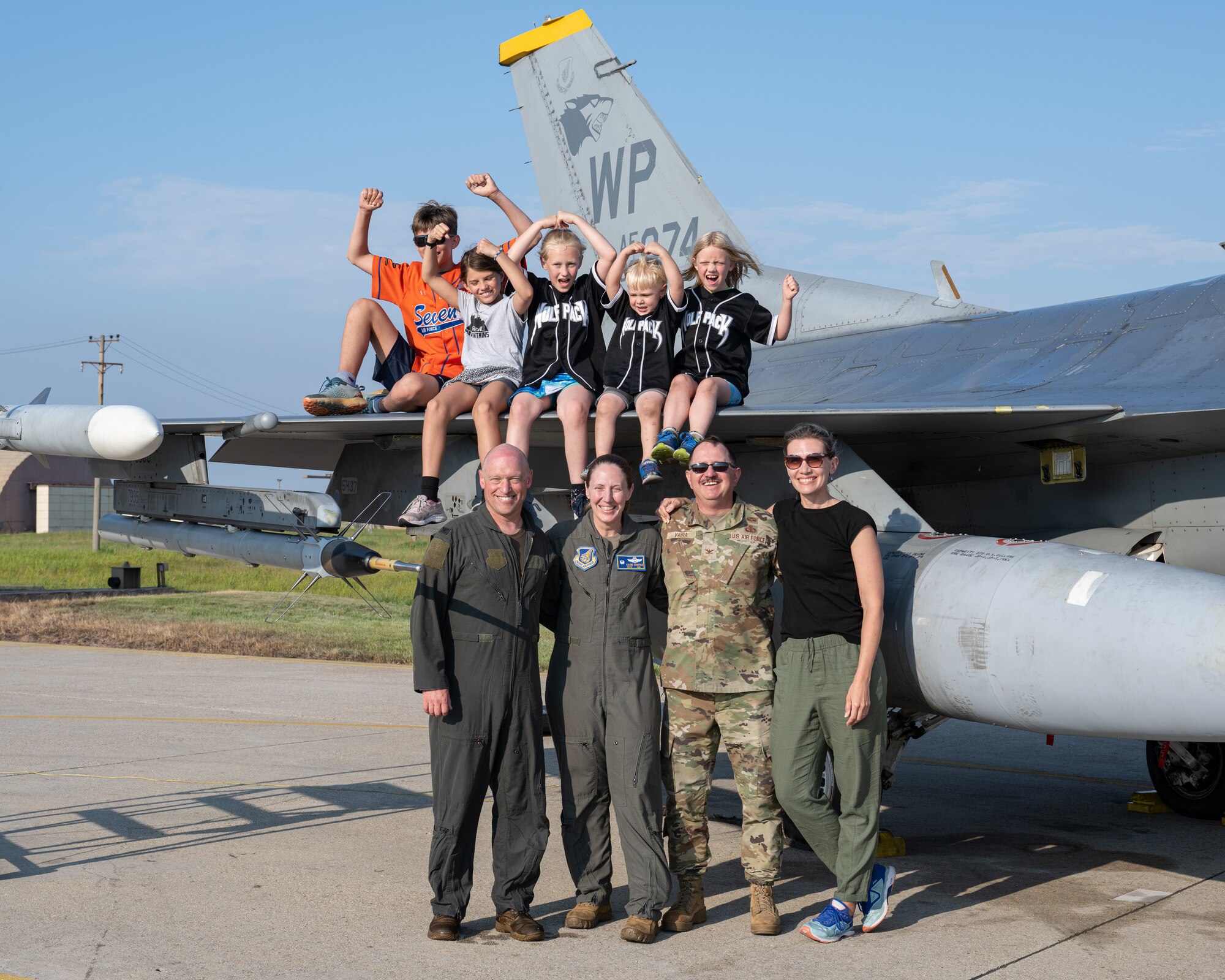 U.S. Air Force Col. Matthew C. Gaetke, 8th Fighter Wing commander, celebrates with friends and family after his final flight at Kunsan Air Base, Republic of Korea