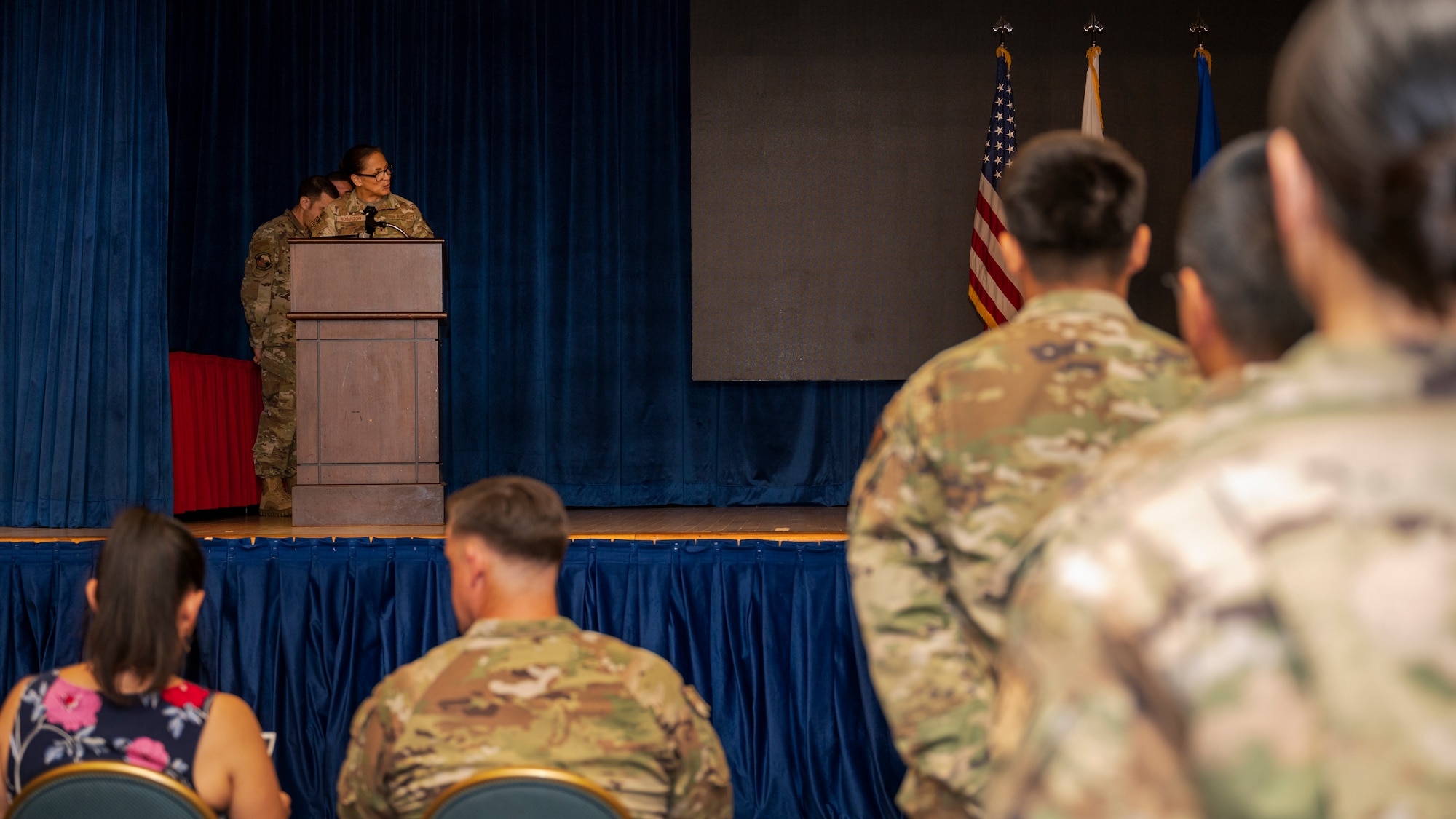 U.S. Air Force Col. Mocha Robinson, 51st Medical Group commander, gives a speech during the change of command ceremony at Osan Air Base, Republic of Korea, June 11, 2024. Change of command ceremonies are a long-standing military tradition that symbolizes the official transfer of power and duties from the departing commander to the incoming commander. (U.S Air Force photo by Senior Airman Sabrina Fuller-Judd)