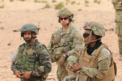 A Moroccan Royal Armed Forces Soldier and Spc. Vanessa Nanevie, a combat medic specialist assigned to Charlie Company, 427th Brigade Support Battalion, 27th Infantry Brigade Combat Team, New York National Guard, learn to safely assemble explosives as part of demolition training provided by 6th Engineer Support Battalion, 4th Marine Logistics Group, Marine Corps Forces during exercise African Lion in Tantan, Morocco, May 28, 2024. African Lion 2024 marks the 20th anniversary of U.S. Africa Command’s premier joint exercise led by U.S. Army Southern European Task Force, Africa (SETAF-AF), running from April 19 to May 31 across Ghana, Morocco, Senegal and Tunisia, with over 9,100 participants from 27 nations and NATO contingents.