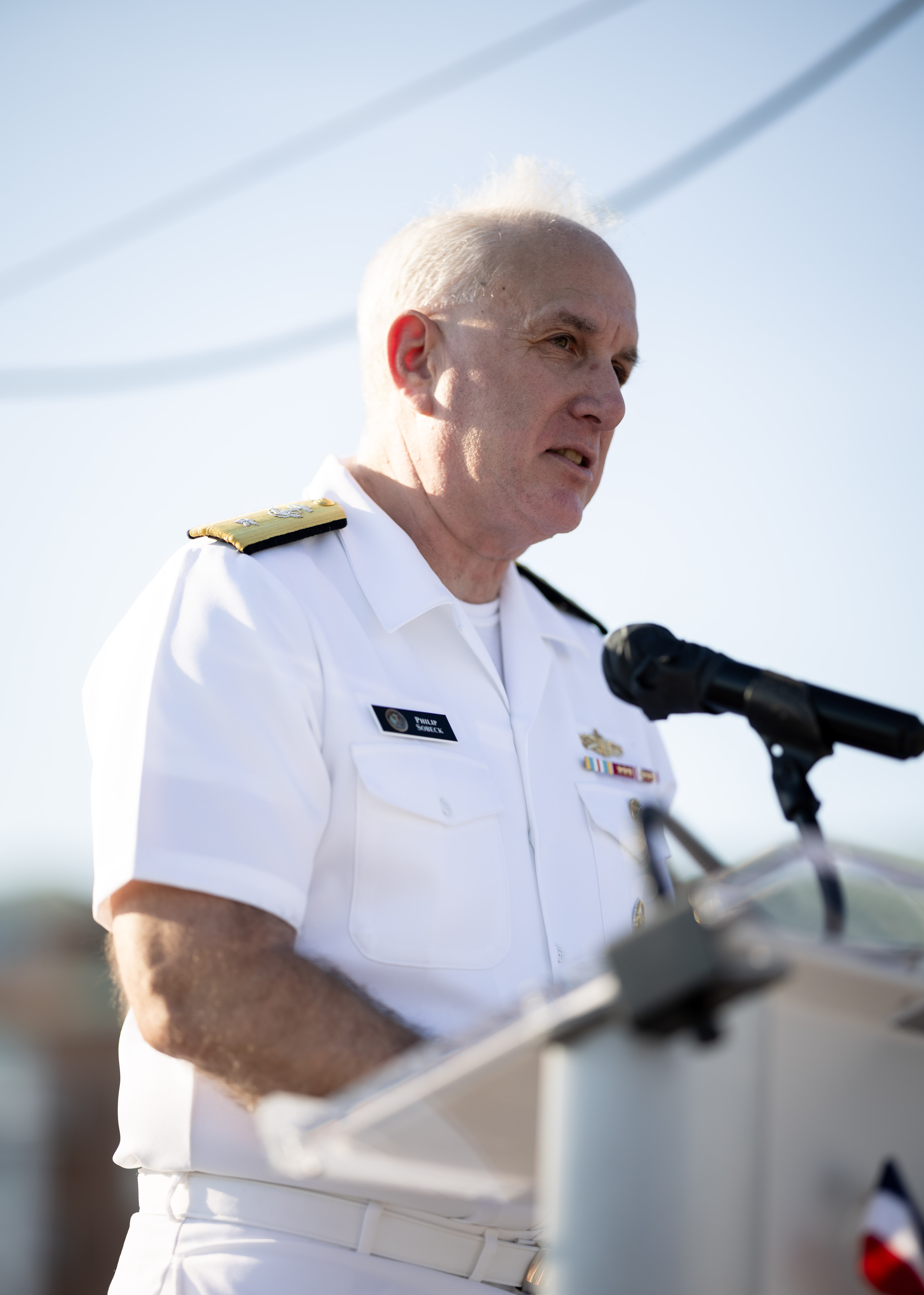 Rear Adm. Philip Sobeck, Commander, Military Sealift Command, delivers remarks during the 2024 National Maritime Day ceremony hosted by the Propeller Club, Port of Norfolk, on board USS Wisconsin (BB-64) May 22, 2024. National Maritime Day honors the work and contributions of past merchant seaman who endured the perils of the sea during times of war and peace, and recognizes those who proudly carry on that tradition today.