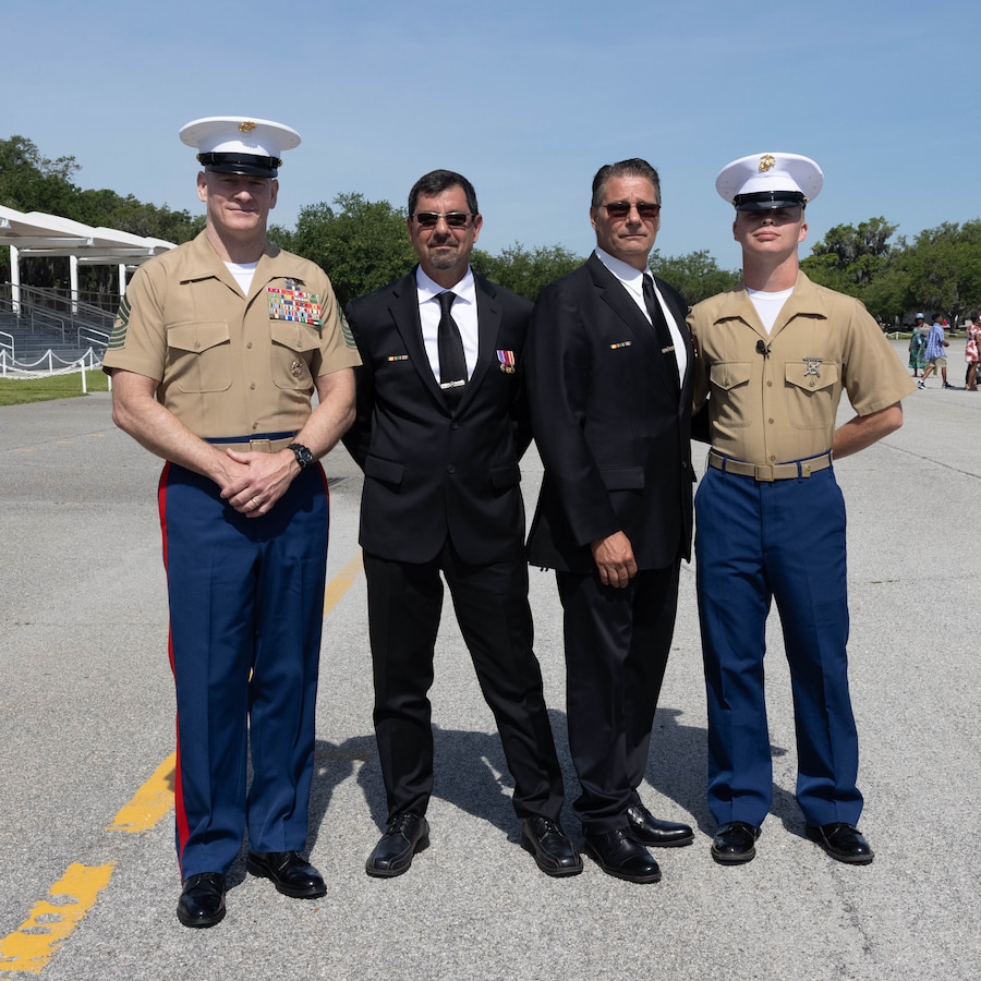 Pvt. William Smith, a recruit with Bravo Company, 1st Recruit Training Battalion, stands with Senior Enlisted Advisor to the Joint Chief of Staff Sgt. Maj. Troy Black, Marine veterans John Weant, and Dan Kovach on Marine Corps Recruit Depot Parris Island, S.C., May 31, 2024. Smith’s grandfather was killed in action during the Beirut bombing in Oct. 1983 and Weant and Kovach were two Marines he served with. (U.S. Marine Corps Photo by Cpl. Dakota Dodd)