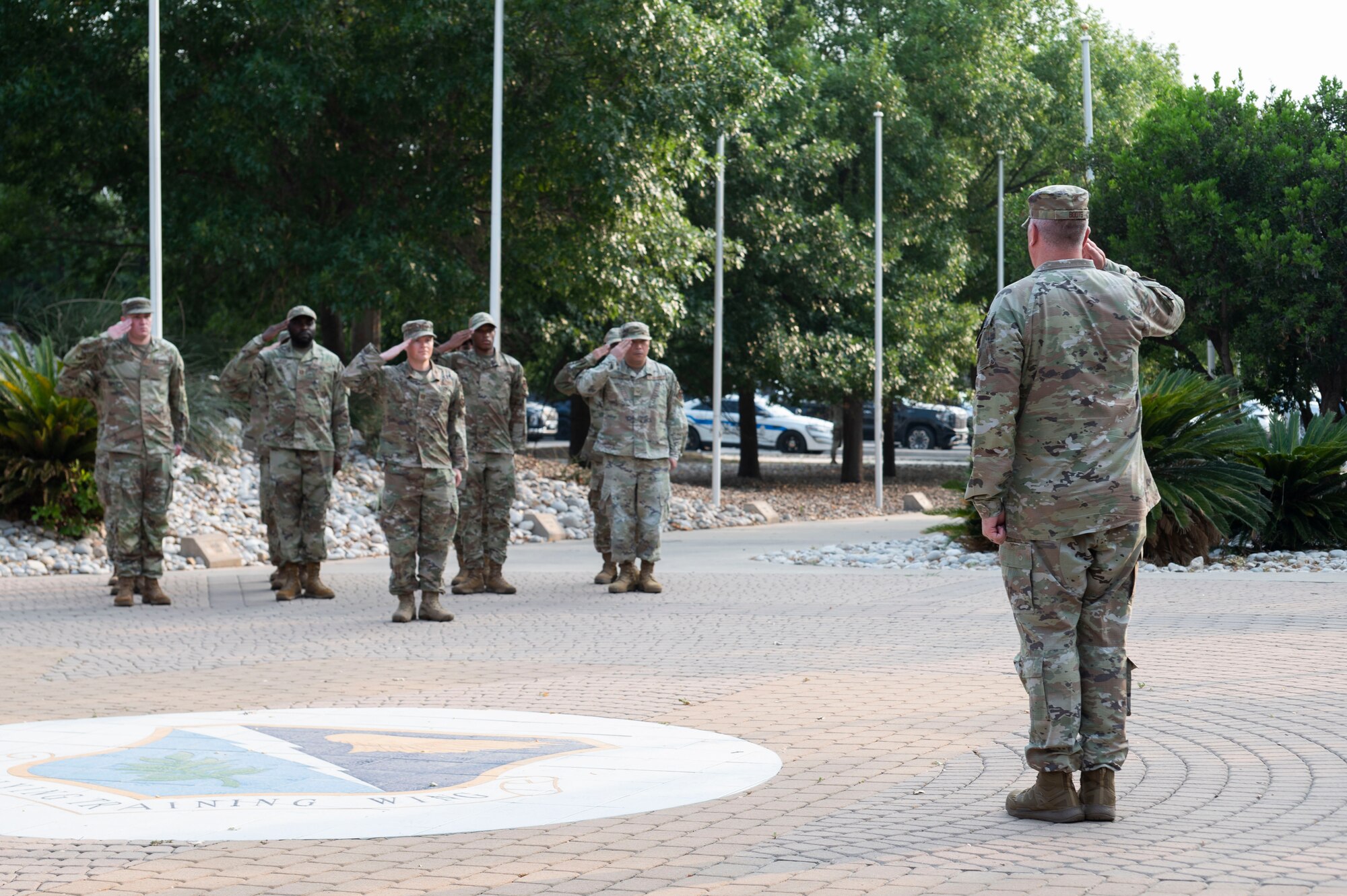 U.S. Air Force Lt. Col. Neil Boots (right), former 47th Healthcare Operations Squadron (HCOS) commander, presents representatives of his squadron a final salute before he relinquishes command during the 47th HCOS change of command ceremony at Laughlin Air Force Base, Texas, June 7, 2024. As commander, Boots led 47th HCOS Airmen in providing healthcare services and support in Family Health, Pediatrics, Women’s Health, Laboratory, Radiology, Pharmacy, Immunizations, TRICARE and Patient Administration Services, Resource Management, Information Systems and Logistics. (U.S. Air Force photo by Senior Airman Kailee Reynolds)