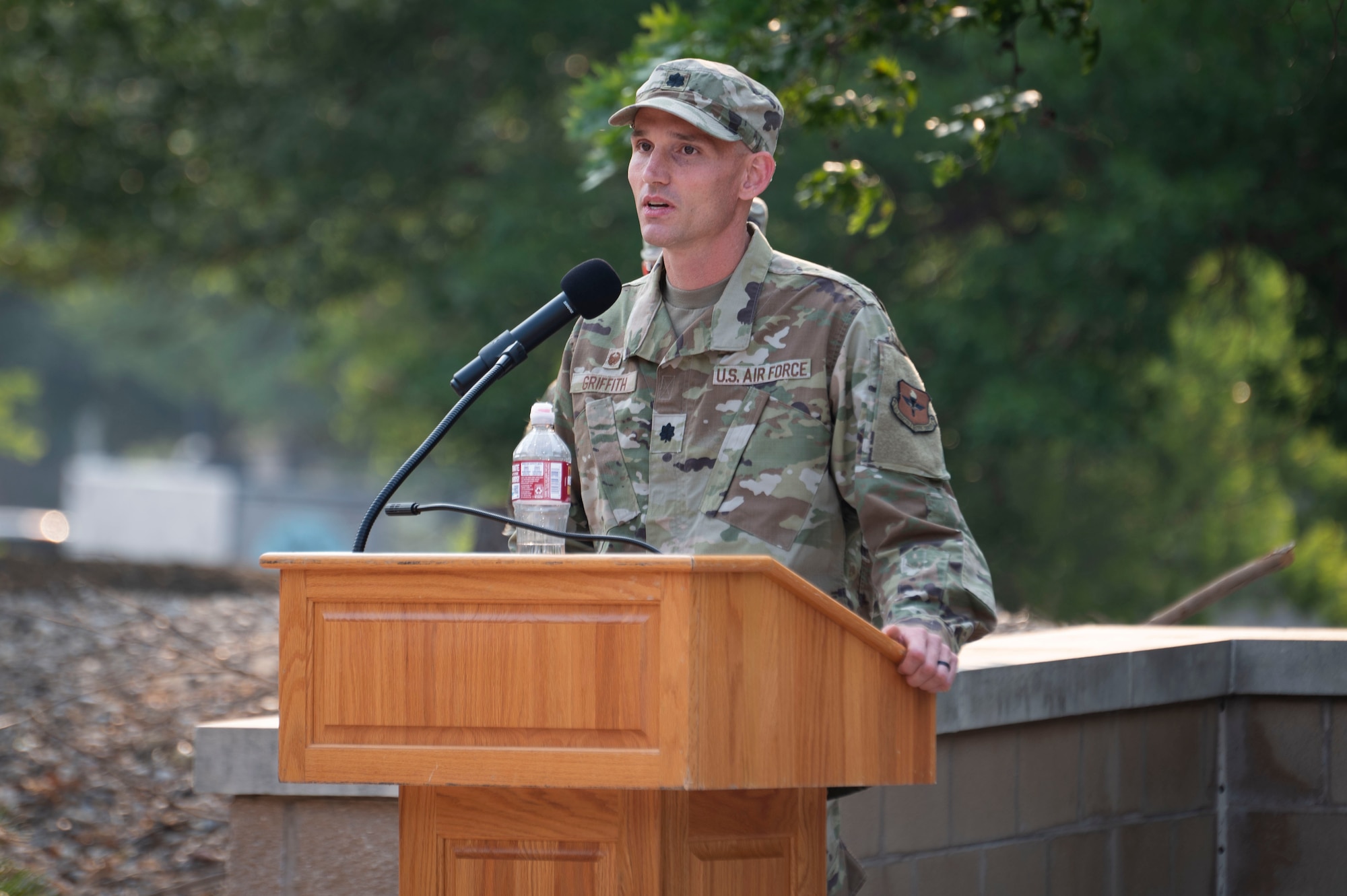 U.S. Air Force Lt. Col. Daniel Griffith, 47th Healthcare Operations Squadron (HCOS) commander, gives a speech during the 47th HCOS change of command ceremony at Laughlin Air Force Base, Texas, June 7, 2024. As the new commander of the 47th HCOS, Griffith will lead Airmen in providing healthcare services and support in Family Health, Pediatrics, Women’s Health, Laboratory, Radiology, Pharmacy, Immunizations, TRICARE and Patient Administration Services, Resource Management, Information Systems and Logistics. (U.S. Air Force photo by Senior Airman Kailee Reynolds)