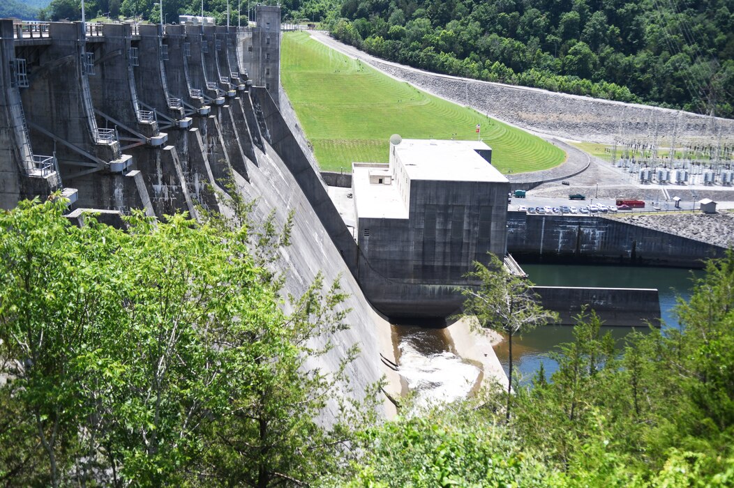 Water flows through the newly reinstalled orifice gate at Center Hill Dam in Lancaster, Tennessee, June 10, 2024. The reinstallation of the gate by the U.S. Army Corps of Engineers establishes a new summer/fall minimum flow regime aimed at enhancing the habitat of the renowned cold-water trout fishery situated below the dam on Caney Fork River. (USACE Photo by Mike Davis)