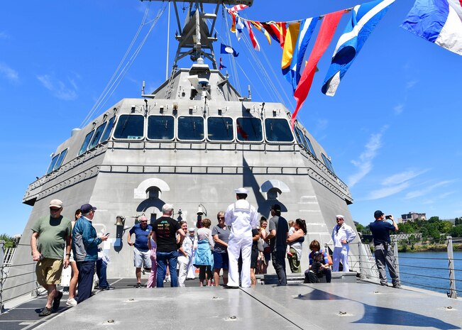 Damage Controlman 3rd Class Matthew Nacional, assigned to the Independence-variant littoral combat ship USS Montgomery (LCS 8), speaks to a tour group during Portland Fleet Week in Portland, Oregon June 6, 2024. Portland Fleet Week is a time-honored celebration of the sea services and provides an opportunity for the citizens of Oregon to meet Sailors, Marines and Coast Guardsmen, as well as witness firsthand the latest capabilities of today’s maritime services. (U.S. Navy photo by Mass Communication Specialist 1st Class Heather C. Wamsley)