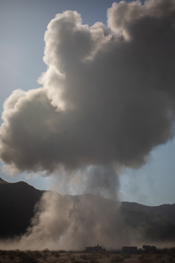 U.S. Marines with 4th Combat Engineer Battalion, 4th Marine Division, Marine Forces Reserve, observe the effects of an anti-personnel obstacle breaching system (APOB) during Integrated Training Exercise 4-24 at Marine Corps Air-Ground Combat Center Twentynine Palms, California, June 11, 2024. ITX enables the reserve component to simulate a mobilization and deploy its forces in preparation for potential future deployments in the event of a contingency or emergency. (U.S. Marine Corps photo by Lance Cpl. St. Pierre)