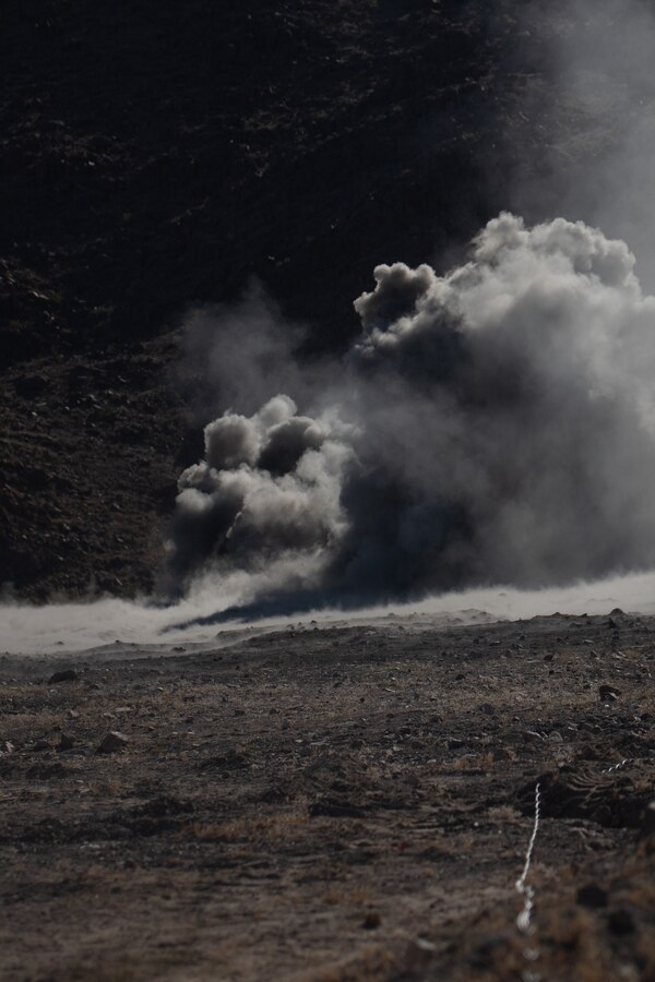 U.S. Marines with 4th Combat Engineer Battalion, 4th Marine Division, Marine Forces Reserve, observe the effects of an anti-personnel obstacle breaching system (APOB) during Integrated Training Exercise 4-24 at Marine Corps Air-Ground Combat Center Twentynine Palms, California, June 11, 2024. ITX enables the reserve component to simulate a mobilization and deploy its forces in preparation for potential future deployments in the event of a contingency or emergency. (U.S. Marine Corps photo by Lance Cpl. St. Pierre)