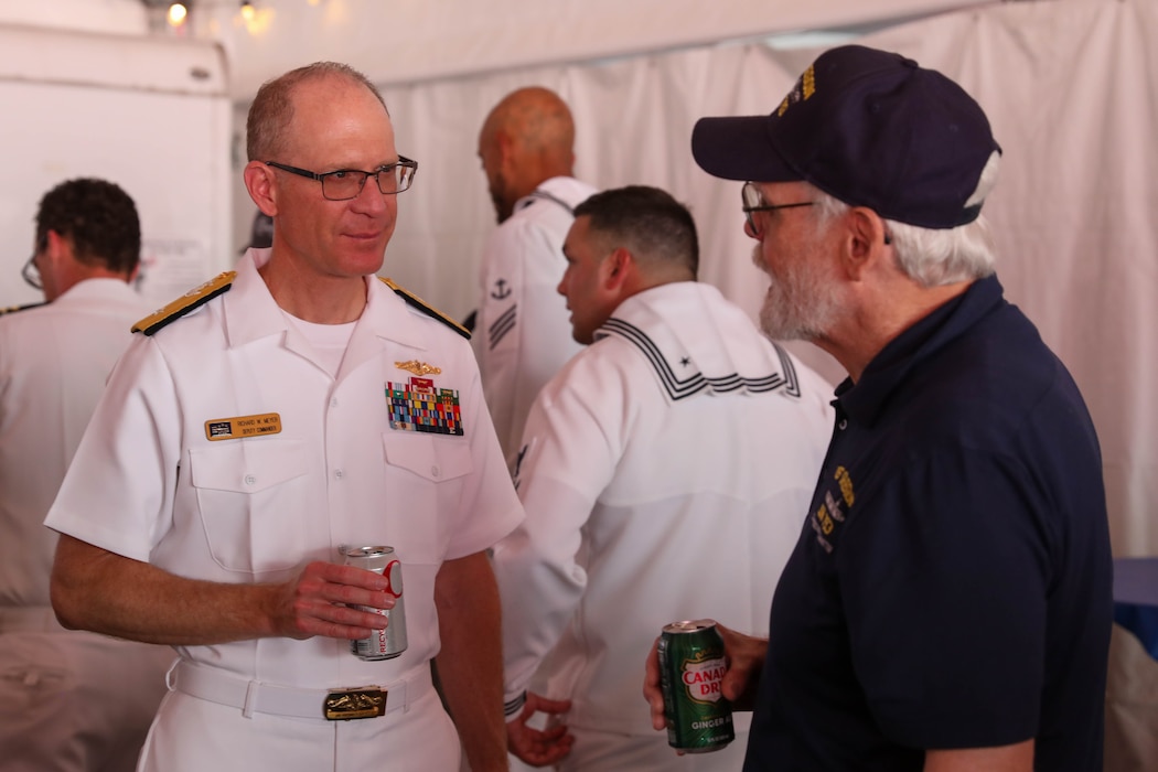 U.S. Navy Rear Adm. Richard Meyer, Deputy Commander of the U.S. 3rd Fleet, speaks with Arlo Gatchel during a Sip to Shore Reception for Portland Fleet Week June 6, 2024. Portland Fleet Week is a time-honored celebration of the sea services and provides an opportunity for the citizens of Oregon to meet Sailors, Marines and Coast Guardsmen, as well as witness firsthand the latest capabilities of today’s maritime services. (U.S. Navy photo by Mass Communication Specialist 3rd Class Justin Ontiveros)